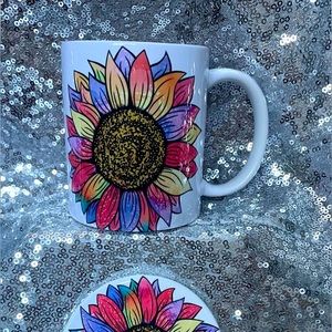 Colorful sunflower mug with matching coaster.